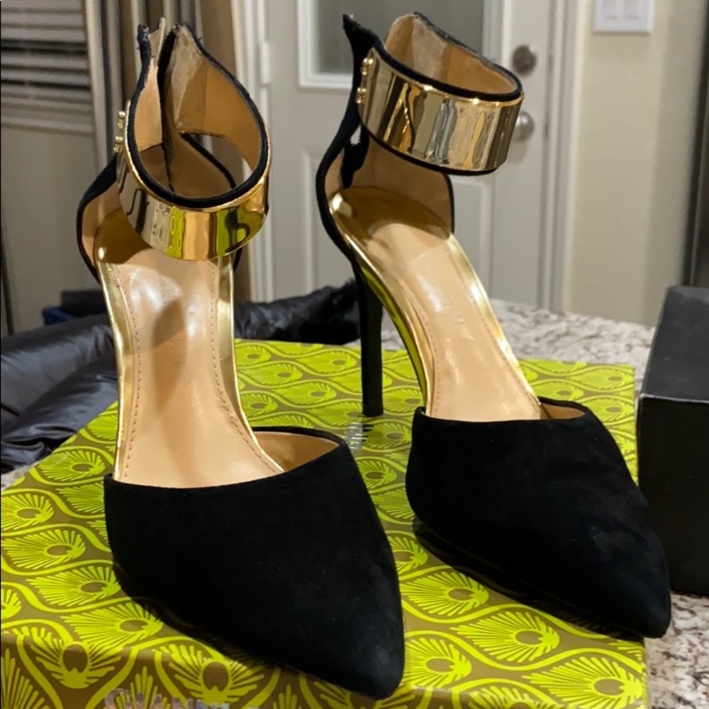 Black heel with gold ankle strap